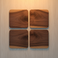 Overhead flat-lay of four solid walnut coasters in a 2x2 grid on white oak tabletop